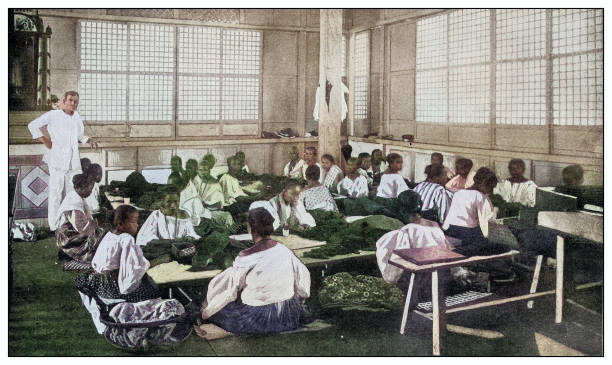 istock Antique black and white photograph: Cigar factory, Philippines 2120813806