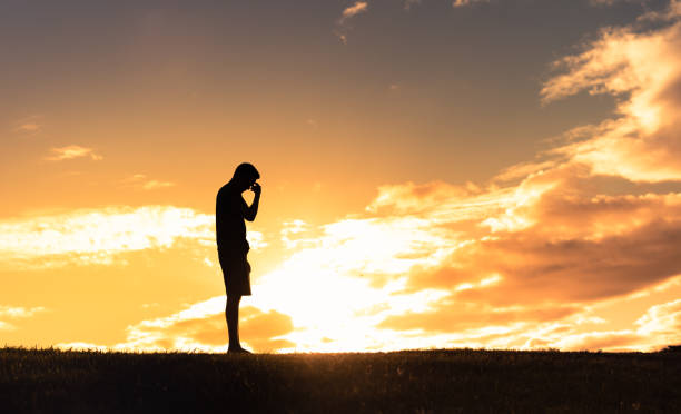 istock Sad tired depressed man walking alone. 2120845459