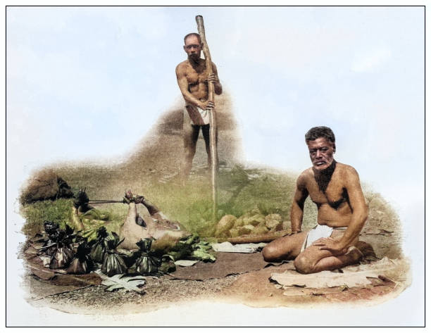 Antique black and white photograph of people from islands in the Caribbean and in the Pacific Ocean; Cuba, Hawaii, Philippines and others: Preparing for a feast, Hawaii