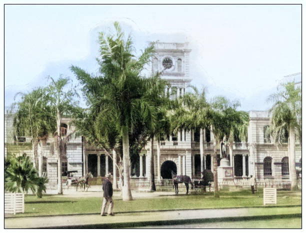 Antique black and white photograph of people from islands in the Caribbean and in the Pacific Ocean; Cuba, Hawaii, Philippines and others: Government house, Honolulu, Hawaii