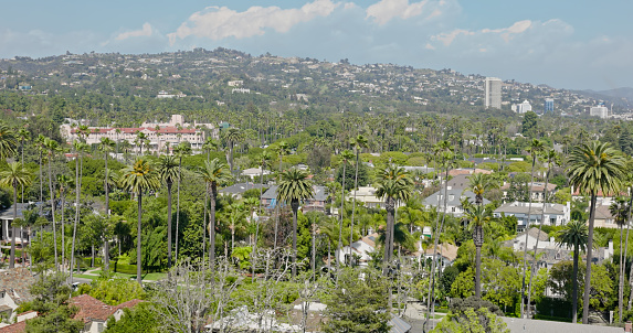 Aerial shot of Beverly Hills on a sunny, Spring day in Los Angeles, California.\nAuthorization was obtained from the FAA for this operation in restricted airspace.