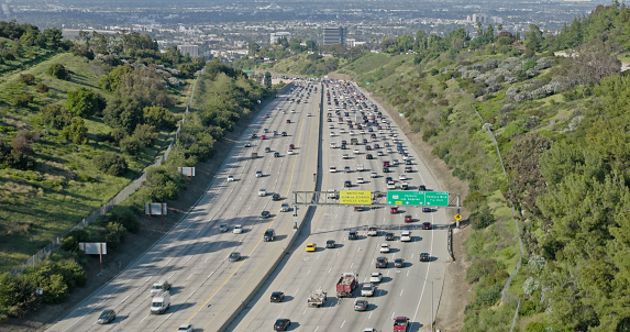Aerial shot of the 405 freeway in Los Angeles, California.\nAuthorization was obtained from the FAA for this operation in restricted airspace.