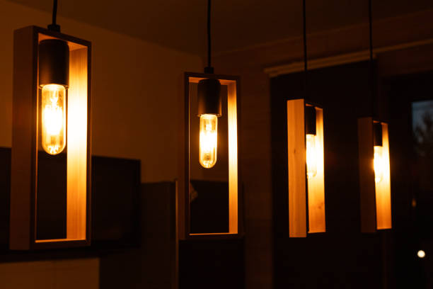 istock kitchen interior, lighting lamps above the bar counter in the kitchen 2120915630