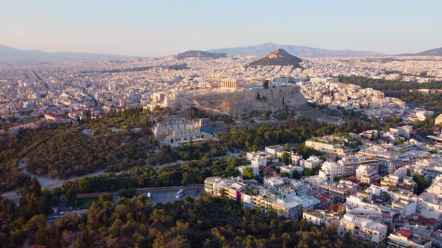 Acropolis in Greece, Parthenon in Athens aerial drone view, famous Greek tourist attraction, Ancient Greece landmark. High quality 4k footage