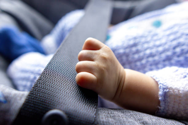 istock newborn baby fist 2120962435