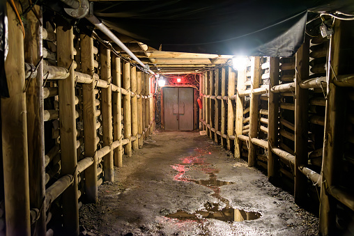 Underground tunnel in coal mine with closed airlock doors