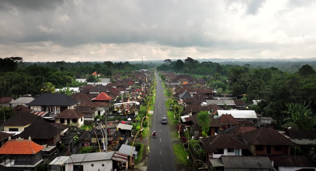 Village in celebration of Nyepi or Balinese Day of Silence, Indonesia. Aerial forward