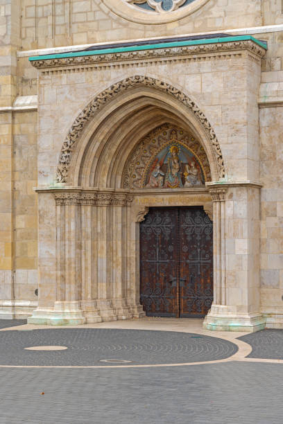Budapest, Hungary - July 31, 2022: Entrance Door to King Matthias Roman Catholic Church at Fisherman Bastion First District Historic Landmark.