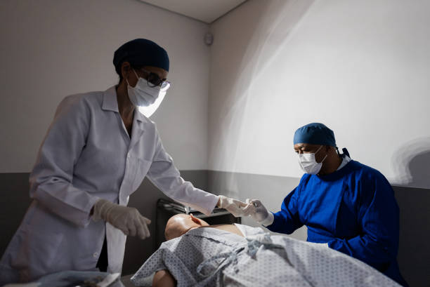 istock Doctors doing surgery on patient at hospital 2121062340