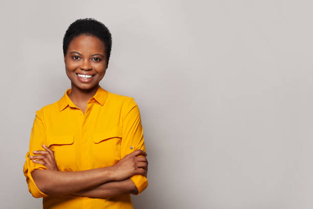 istock Successful happy woman smiling and having fun against white studio wall background, emotional expression portrait 2121102038