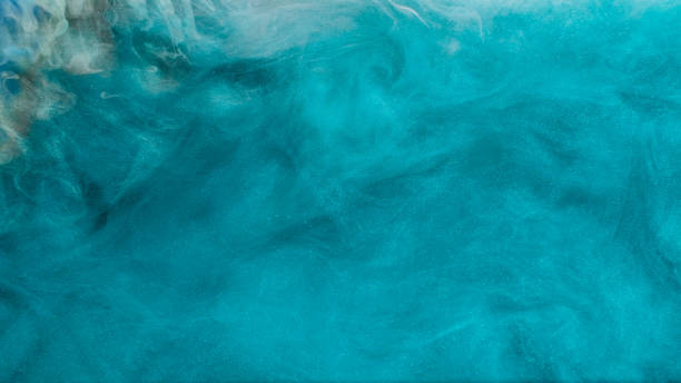 istock Glitter mist texture color smoke cyan blue ink 2121102993