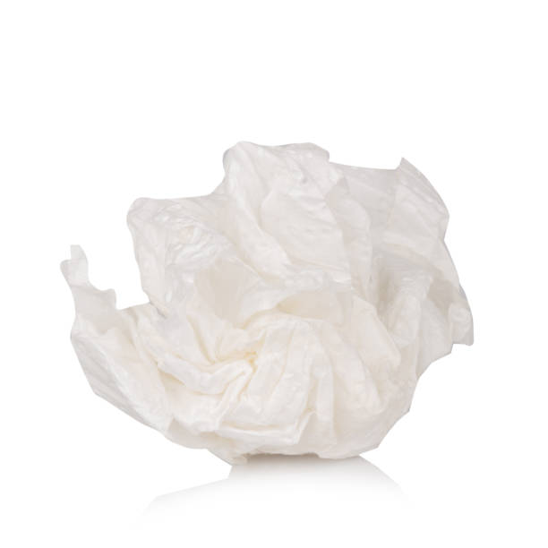 istock Toilet paper ball isolated on white background 2121159473