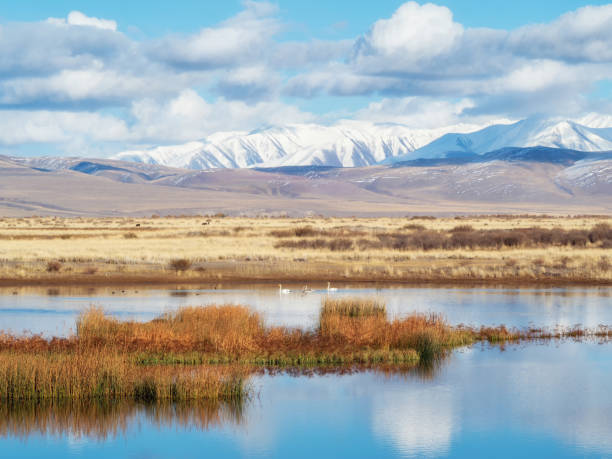 istock Beautiful autumn mountain lake and mountains. 2121206792