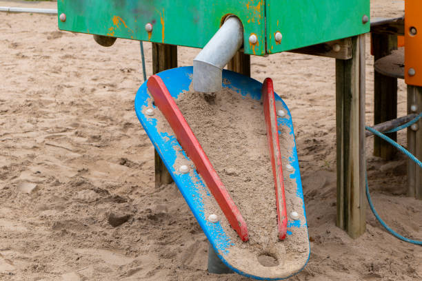 a sand slide on a childrens playground