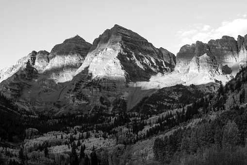 Whistler, British Columbia, Canada. Beautiful Panoramic View of the Canadian Snow Covered Mountain Landscape during a cloudy and vibrant winter sunset. Black and White Art