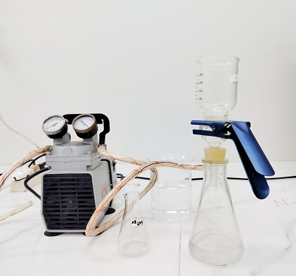 filtration process using a vacuum pump in the laboratory