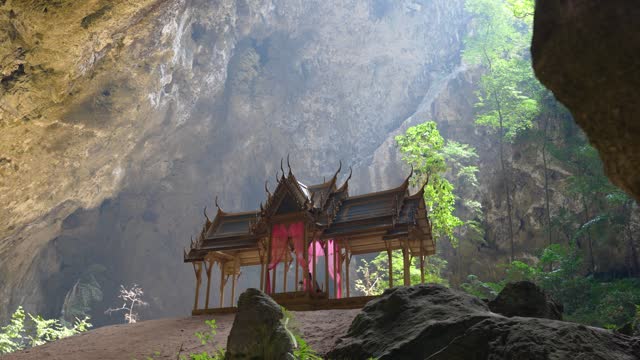 Pavilion in Phraya Nakhon Cave, Thailand, with sunbeam illuminating the temple
