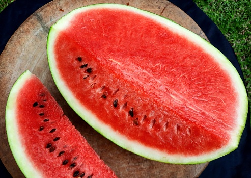 Cutting Watermelon fruit - food preparation.