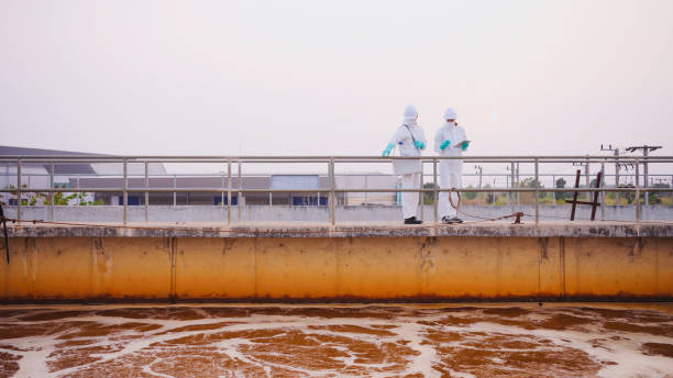 istock Environmental Engineers Check the Control System at the Water Treatment Plant. 2121283770