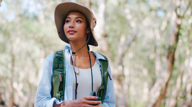 istock Women travel in the forest. 2121283782