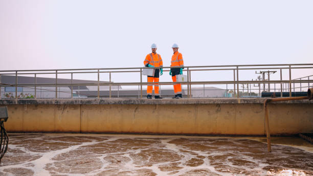 istock Environmental Engineers Check the Control System at the Water Treatment Plant. 2121283783