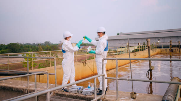 istock Environmental Engineers Check the Control System at the Water Treatment Plant. 2121283785
