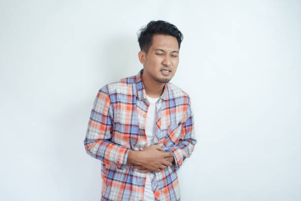 istock Asian man got bad stomach ache 2121359494