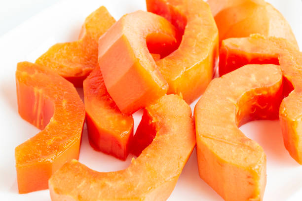 Papaya flesh is bright yellow, sweet and delicious. The fruit contains vitamins.
