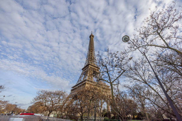 View of Eiffel Tower from the top deck of a hop-on hop-off Tootbus in Paris, France, on Christmas Eve 2023