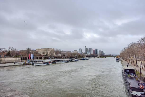 On Pont (Bridge) d'lena over Seine River looking toward Pont (Bridge) de Bir-Hakeim on a cloudy Christmas Day 2023