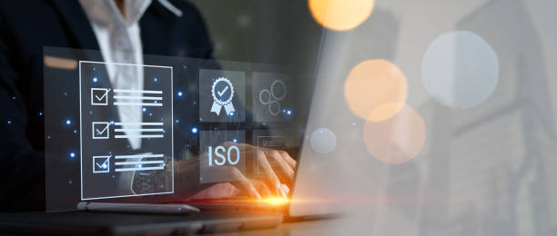 istock ISO standards quality control, assurance and warranty business technology concept. Touching on screen with ISO and globe icons on smart background. ISO Standard certification. Modern ISO banner. 2121535403