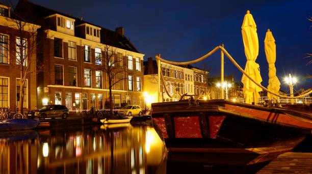 istock The Netherlands October 2020 River night reflection, long exposure 2121543610