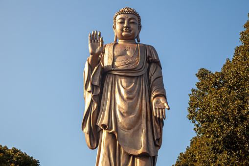 Ancient Buddha statue at Wat Wora pho. Ayutthaya. Phra Nakhon Si Ayutthaya province. Thailand.
