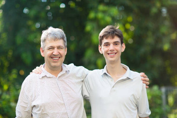 istock Father and son on sunny summer day 2121645148