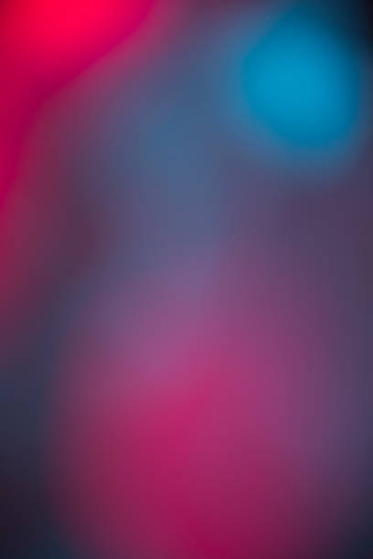 istock Abstract background with defocused neon  light bokeh 2121713168