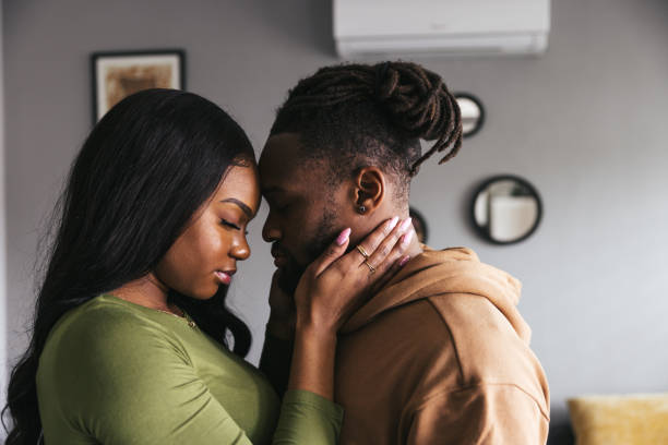 istock Lovely couple at home 2121776671