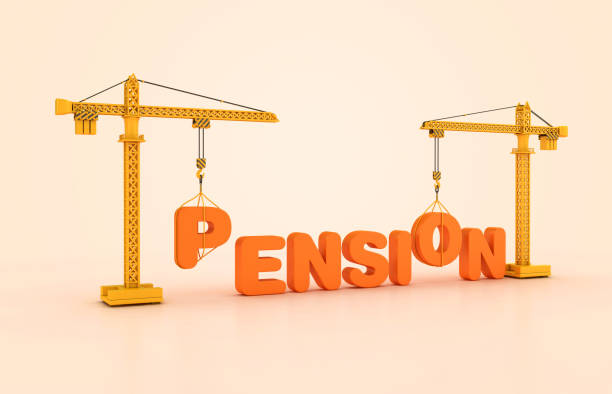 istock PENSION Word with Tower Crane 2121780004
