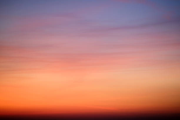 istock The evening sky displayed a stunning array of red and pink clouds 2121780304
