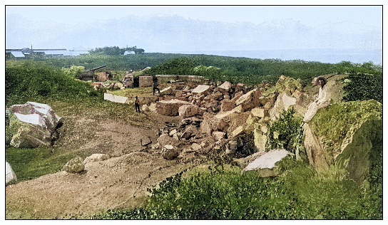 Antique black and white photograph of people from islands in the Caribbean and in the Pacific Ocean; Cuba, Hawaii, Philippines and others: Demolished fortification, Sangley, Manila Bay, Philippines