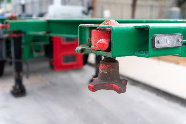 Twistlock on a corner panel of a container trailer.