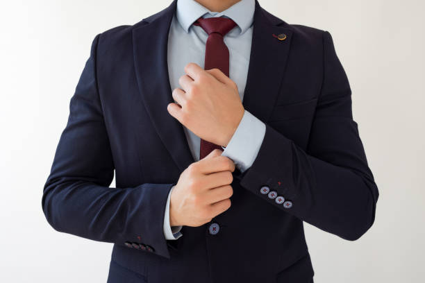 istock Businessman adjusting cufflinks 2121885754