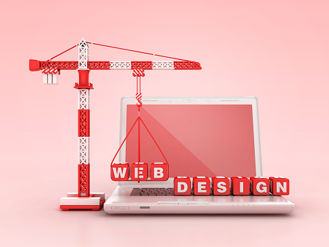 WEB DESIGN Blocks with Tower Crane on Computer Laptop - Color Background - 3D Rendering