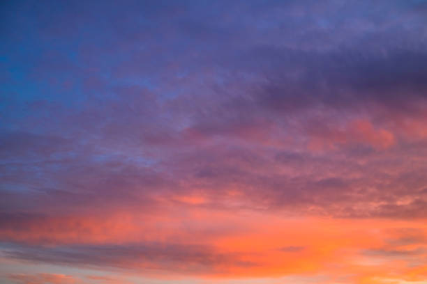 istock Colorful clouds in a blue sky during sunset 2121901481