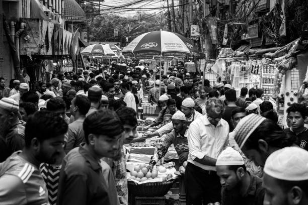 Chak Iftar Bazar, nestled in Dhaka's old town, buzzes with energy during Ramadan. This image was captured on March 24, 2024, from Dhaka, Bangladesh. Vendors offer an array of traditional delicacies, from crispy samosas to sweet jalebis, creating a vibrant tapestry of flavors that entice locals and visitors alike.