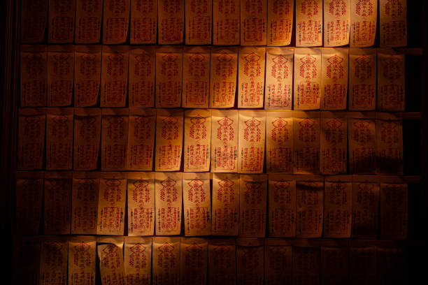 Written prayers are hung in taoist temple in order to bring out good luck, health and wealth