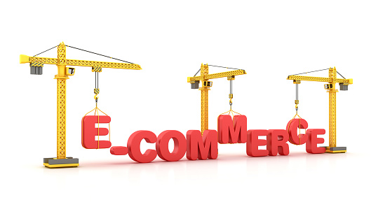 E-COMMERCE Word with Tower Crane - White Background - 3D Rendering