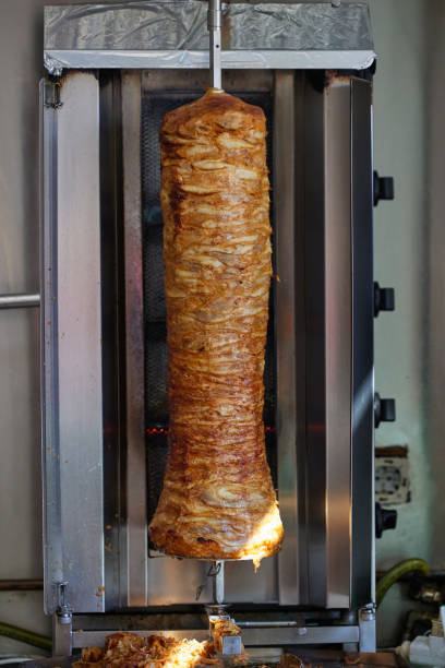 istock Cooking grilled chicken as part shaverma 2121977529