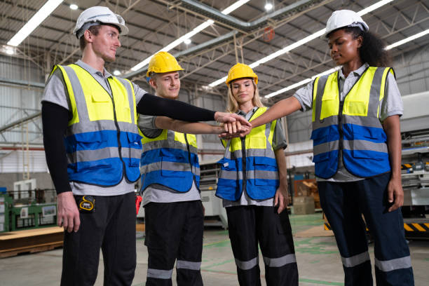istock Hand corporate or join hand for collaboration engineer at indoor factory 2121981830