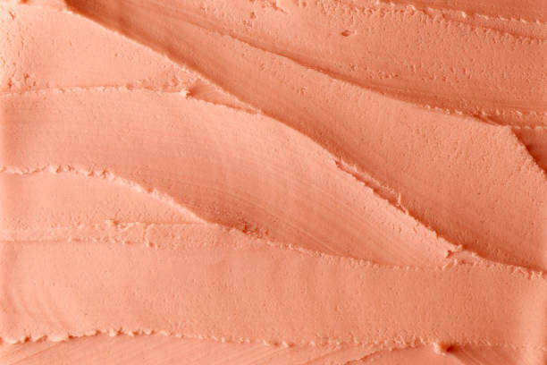 istock Closeup orange creamy texture background 2121981831