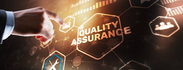 istock QA Businessman pressing Quality assurance button on virtual screens 2122115429